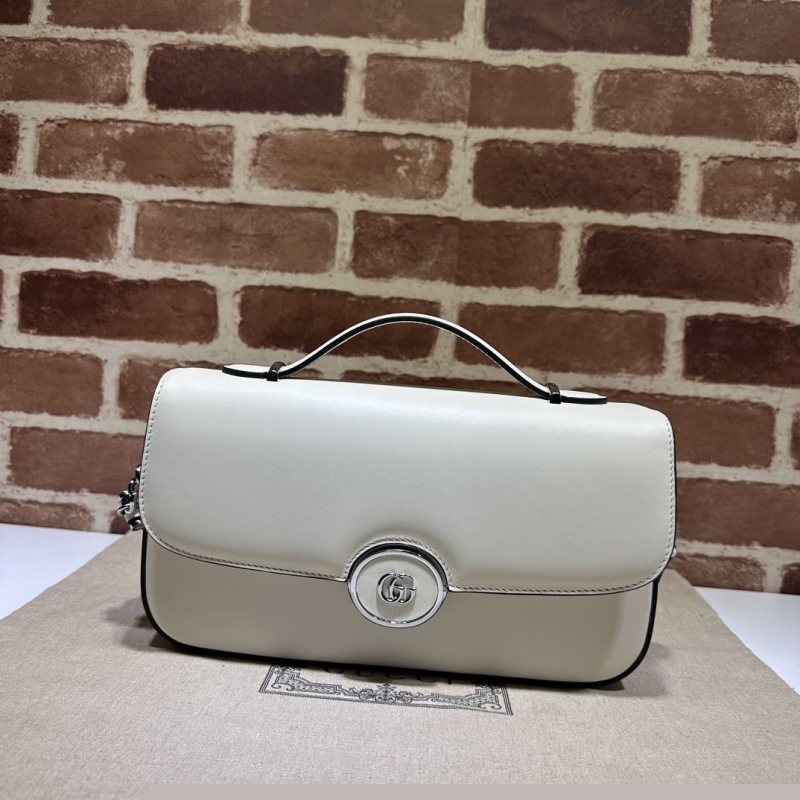 G*u*i top handle bags
